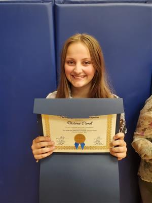Student with award